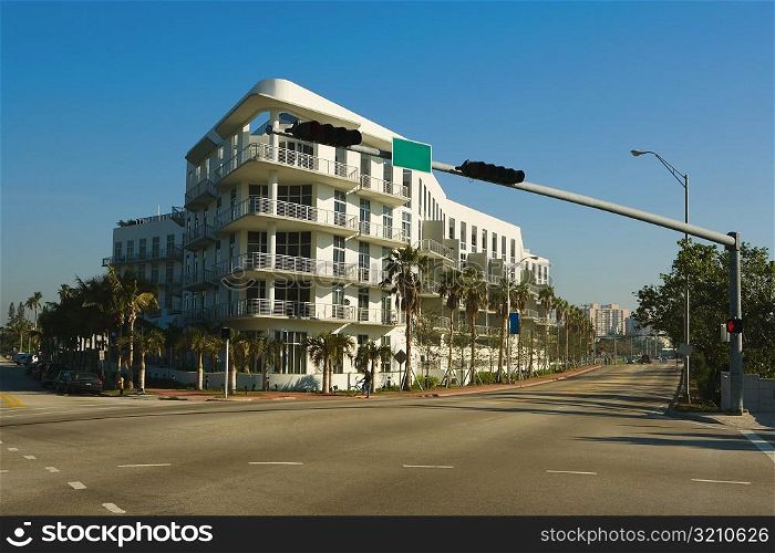 Low angle view of a multi-storeyed building on the roadside, Miami, Florida, USA