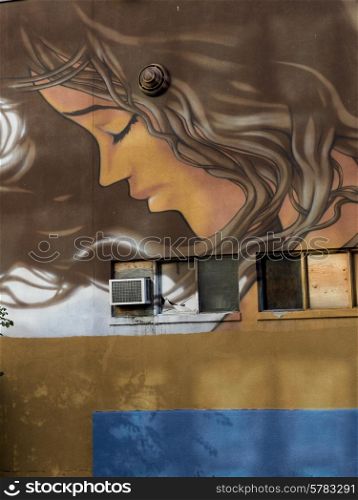 Low angle view of a mural on the wall of a building at Golden Square Mile, Montreal, Quebec, Canada