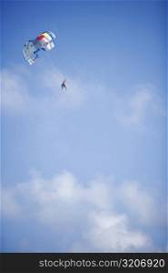 Low angle view of a person parasailing, Miami, Florida, USA