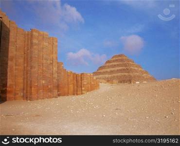 Low angle view of a pyramid in an arid landscape, The Step Pyramid Of Zoser, Saqqara, Egypt