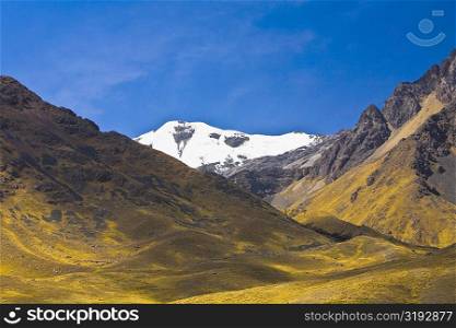 Low angle view of a snowcovered mountain, Puno, Peru