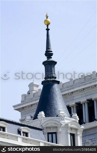 Low angle view of a spire on a building, Madrid, Spain