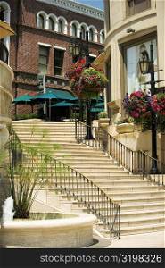 Low angle view of a staircase outside shops, Rodeo Drive, Los Angeles, California, USA