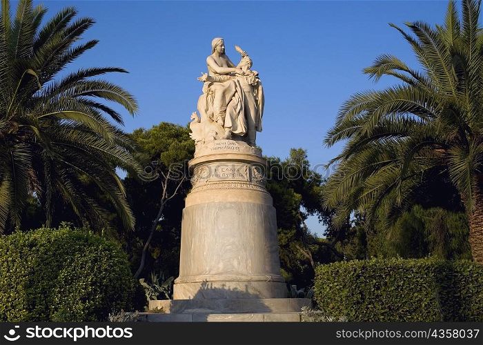 Low angle view of a statue in a garden, National Garden, Athens, Greece