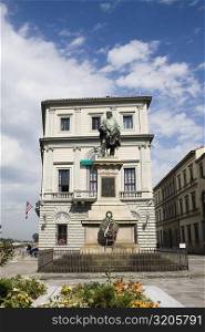 Low angle view of a statue in front of a building, Giuseppe Garibaldi, Florence, Italy