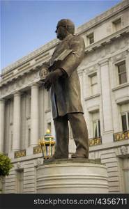 Low angle view of a statue in front of a building, San Francisco, California, USA