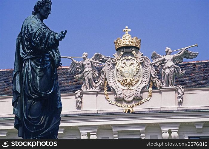 Low angle view of a statue in front of a palace, Hofburg Palace, Vienna, Austria