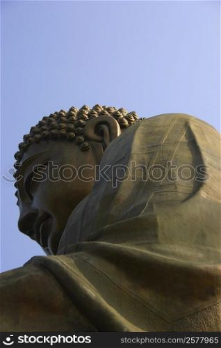 Low angle view of a statue of Buddha, Tian Tan Buddha, Po Lin Monastery, Ngong Ping, Lantau, Hong Kong, China