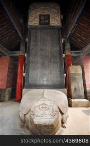 Low angle view of a stone tablet, Thirteen Tablet Pavilions, Temple of Confucius, Qufu, Shandong Province, China