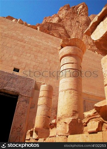 Low angle view of a stone wall and column, Egypt