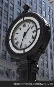 Low angle view of a street clock, Manhattan, New York City, New York State, USA