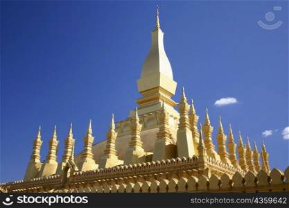 Low angle view of a temple, Buddhist temple, That Luang, Vientiane, Laos