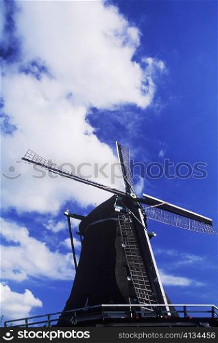 Low angle view of a traditional windmill, Amsterdam, Netherlands