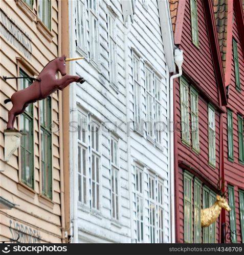 Low angle view of a unicorn statue on a building, Bryggen, Bergen, Norway