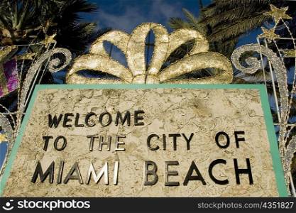 Low angle view of a welcome signboard, Miami Beach, Florida, USA