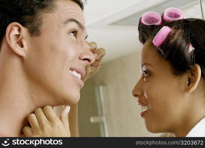 Low angle view of a young man and a teenage girl