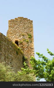 Low angle view of an ancient building, Monteriggioni, Siena Province, Tuscany, Italy