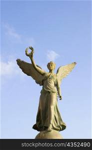 Low angle view of an angel statue, Rhodes, Dodecanese Islands, Greece