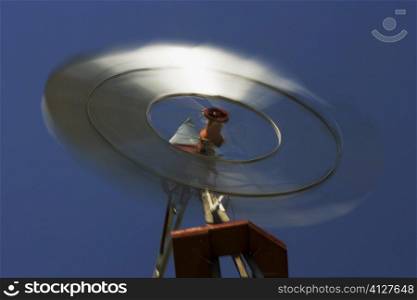Low angle view of an industrial windmill