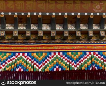 Low angle view of architectural detail of a monastery, Sangchen Choekhor Monastery, Paro, Paro District, Paro Valley, Bhutan