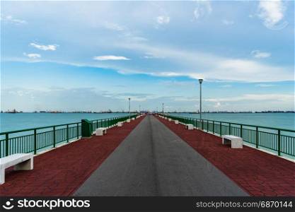 Low angle view of Bedok Jetty Singapore reaching into the sea at East Coast Park