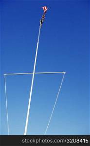 Low angle view of boat mast with the USA Flag waving, Washington DC, USA