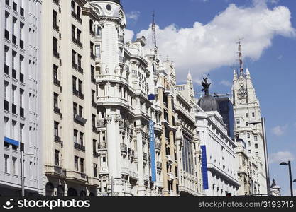 Low angle view of buildings in a city, Madrid, Spain