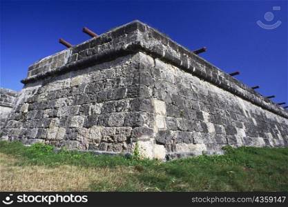 Low angle view of cannons on a stone wall