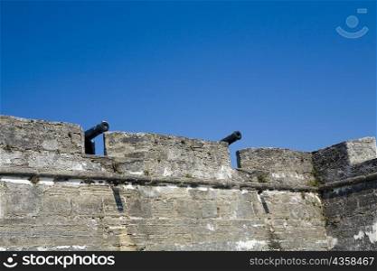 Low angle view of cannons on top of a castle, Castillo De San Marcos National Monument, St Augustine, Florida, USA