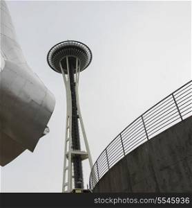 Low angle view of EMP Museum and Space Needle, Seattle, Washington State, USA
