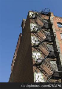Low angle view of fire escape of a building at Golden Square Mile, Montreal, Quebec, Canada
