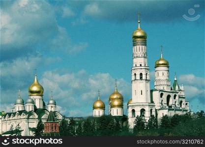 Low angle view of golden cupolas, Bell Tower of Ivan The Great, Moscow, Russia