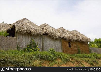 Low angle view of huts in a row, French Harbour, Rotan, Bay Islands, Honduras