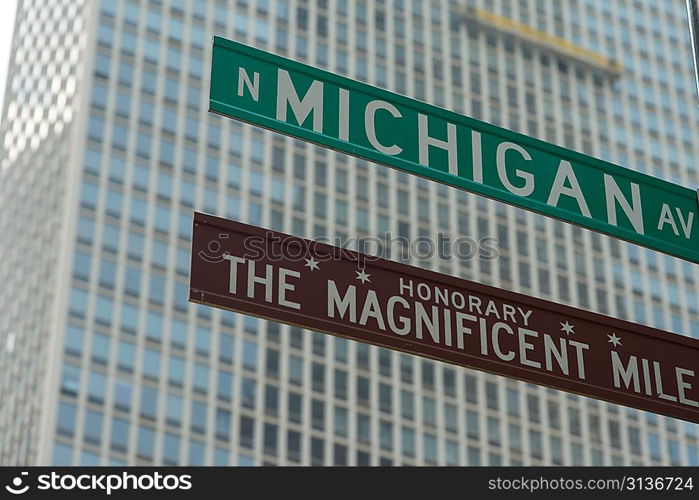 Low angle view of Magnificent Mile, Michigan Avenue signs, Chicago, Cook County, Illinois, USA