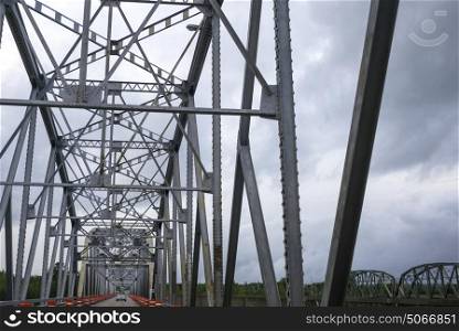 Low angle view of metallic bridge against sky, Derby Junction, New Brunswick, Canada