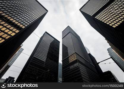 Low angle view of modern skyscrapers in downtown Toronto.