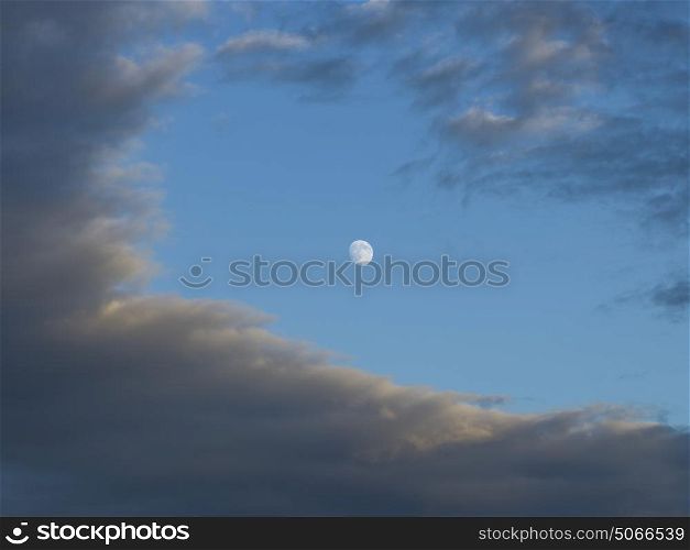 Low angle view of moon and clouds in sky, Lake of The Woods, Ontario, Canada