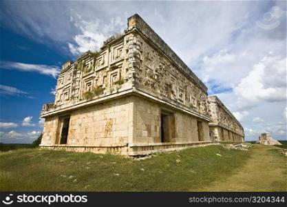 Low angle view of old ruins of a palace, Palacio Del Gobernador, Uxmal, Yucatan, Mexico