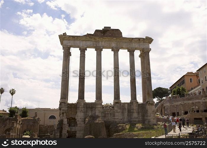 Low angle view of old ruins of columns, Rome, Italy