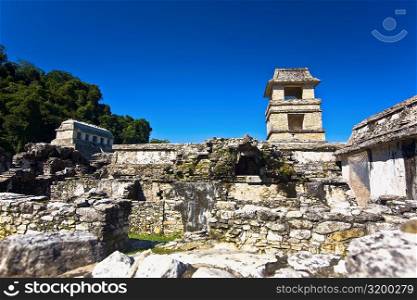 Low angle view of old ruins of the watchtower of a palace, Palenque, Chiapas, Mexico