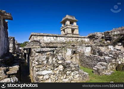 Low angle view of old ruins of the watchtower of a palace, Palenque, Chiapas, Mexico