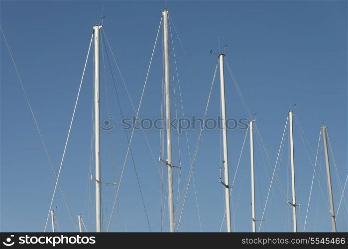 Low angle view of sailboat masts, Riverton, Hecla Grindstone Provincial Park, Manitoba, Canada