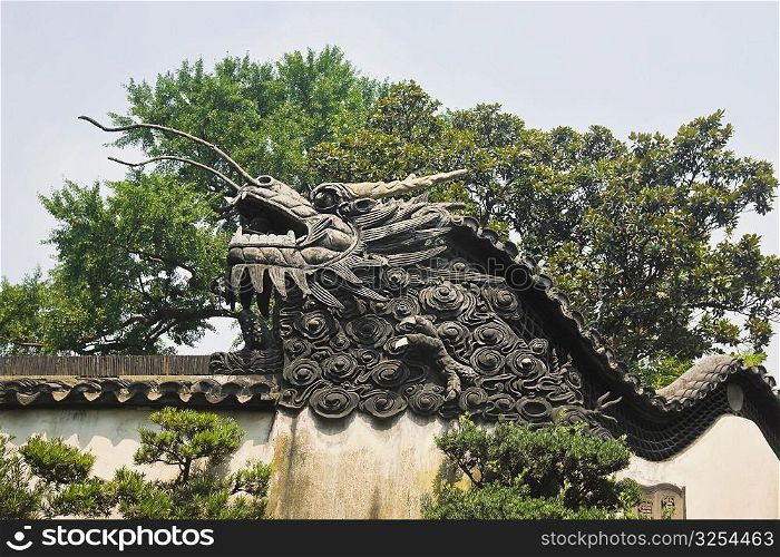 Low angle view of sculpture of a Chinese dragon, Yu Yuan Gardens, Shanghai, China