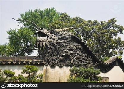 Low angle view of sculpture of a Chinese dragon, Yu Yuan Gardens, Shanghai, China