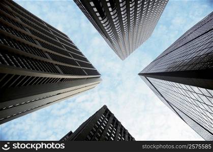 Low angle view of skyscrapers in a city, Chicago, Illinois, USA