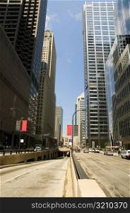 Low angle view of skyscrapers in a city, Chicago, Illinois, USA
