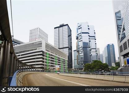 Low angle view of skyscrapers in a city, Des Voeux Road, Hong Kong Island, China