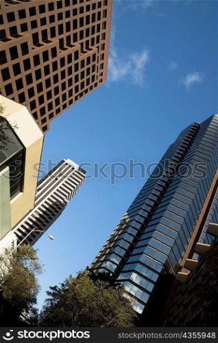 Low angle view of skyscrapers in a city, Honolulu, Oahu, Hawaii Islands, USA