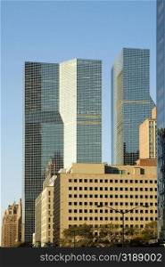 Low angle view of skyscrapers in a city, New York City, New York State, USA