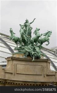 Low angle view of statues, Galeries Nationales du Grand Palais, Paris, Ile-de-France, France
